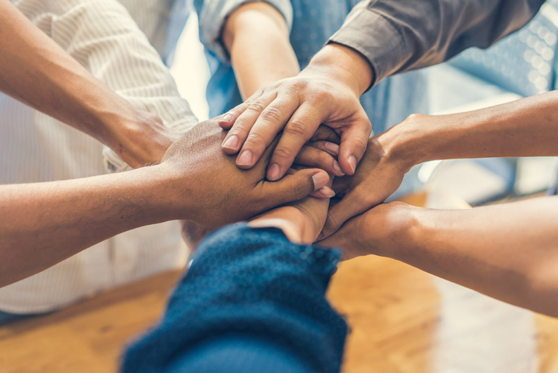 real estate team member hands
